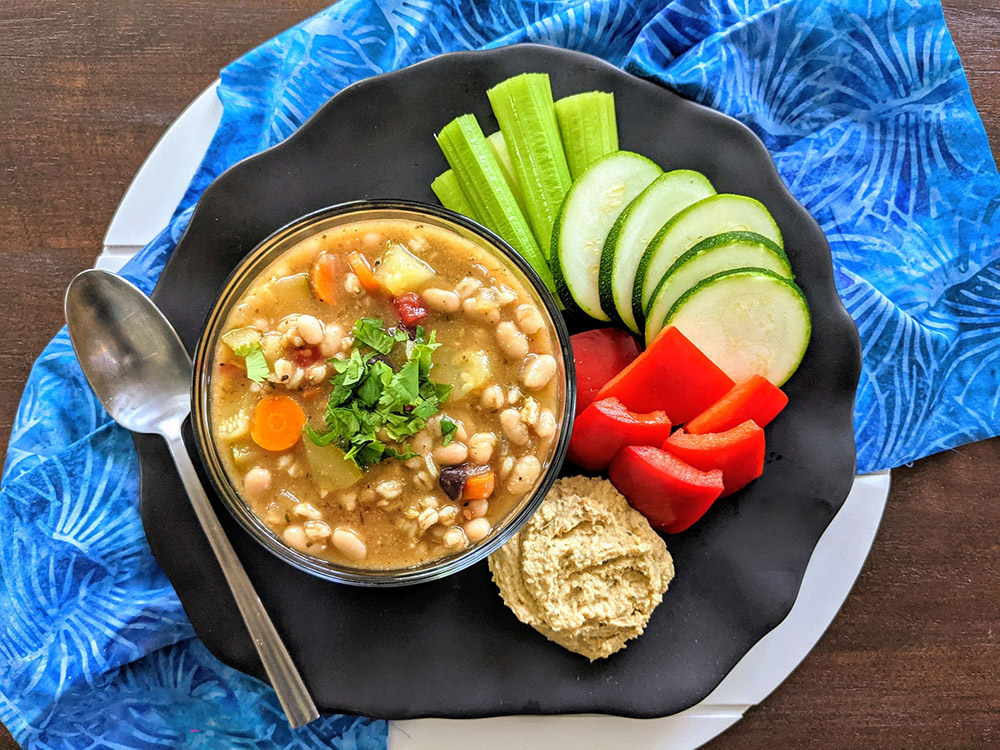 Herby Bean Farro Soup and Veggies Chips Sticks Dip