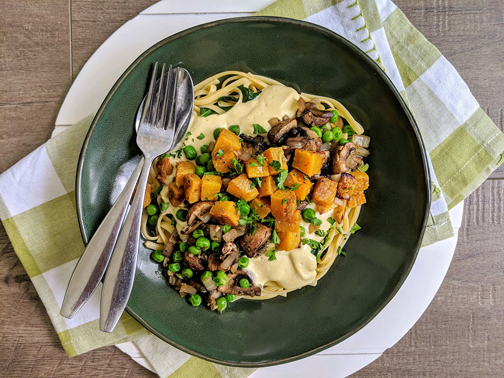 Plant Based OIl Free Creamy Linguine with Roasted Squash and Italian Mushrooms & Peas