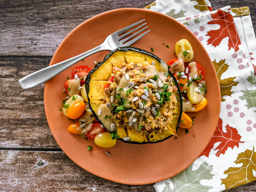 Stuffed Maple Sage Roasted Acorn Squash with  Lemony Tahini Dressing