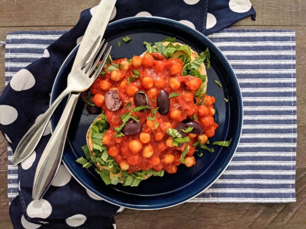 plant based cheesy english muffins with saucy pizza beans