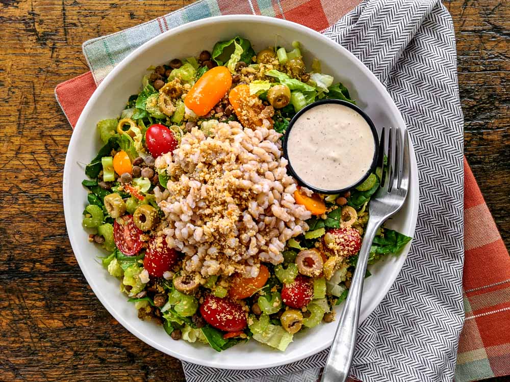 Plant Based Ancient Grain Salad with Lentils, Tomatoes, Olives & Garlicky Vinaigrette