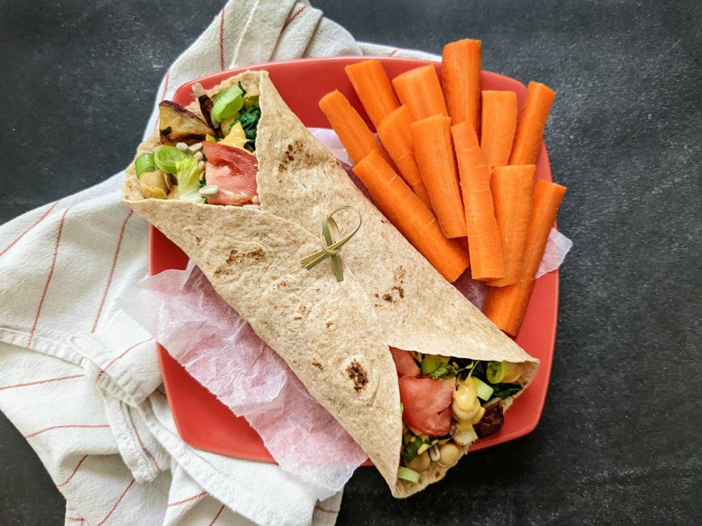 Thrifty Spuds Beans Greens Plant Based Cheesy Wrap and Carrot Sticks