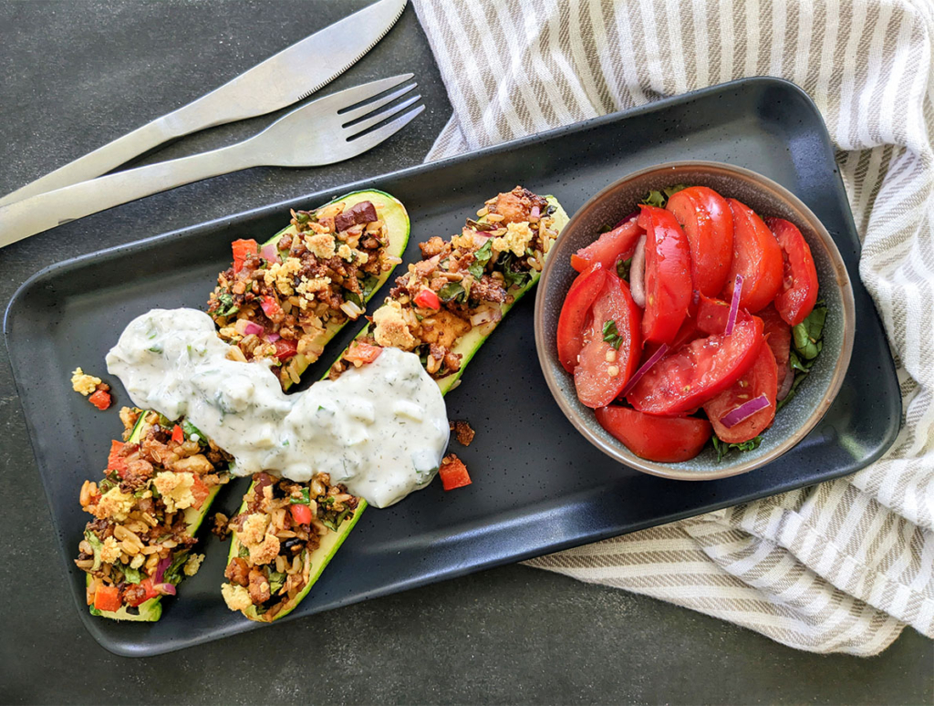 Zesty Tofu Stuffed Vegan Zucchini Boats and Tomato Mint Salad