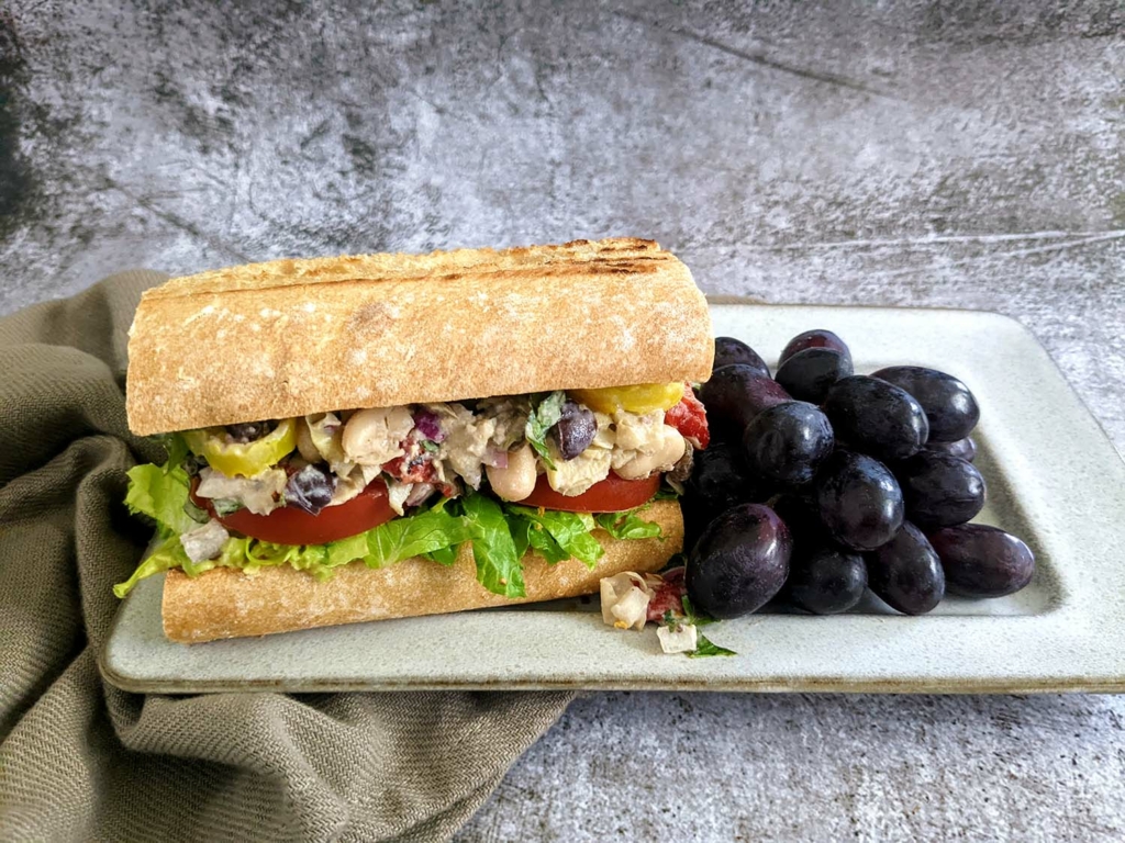 Whole Food Plant Based Easy Antipasto Hoagie and Purple Grapes