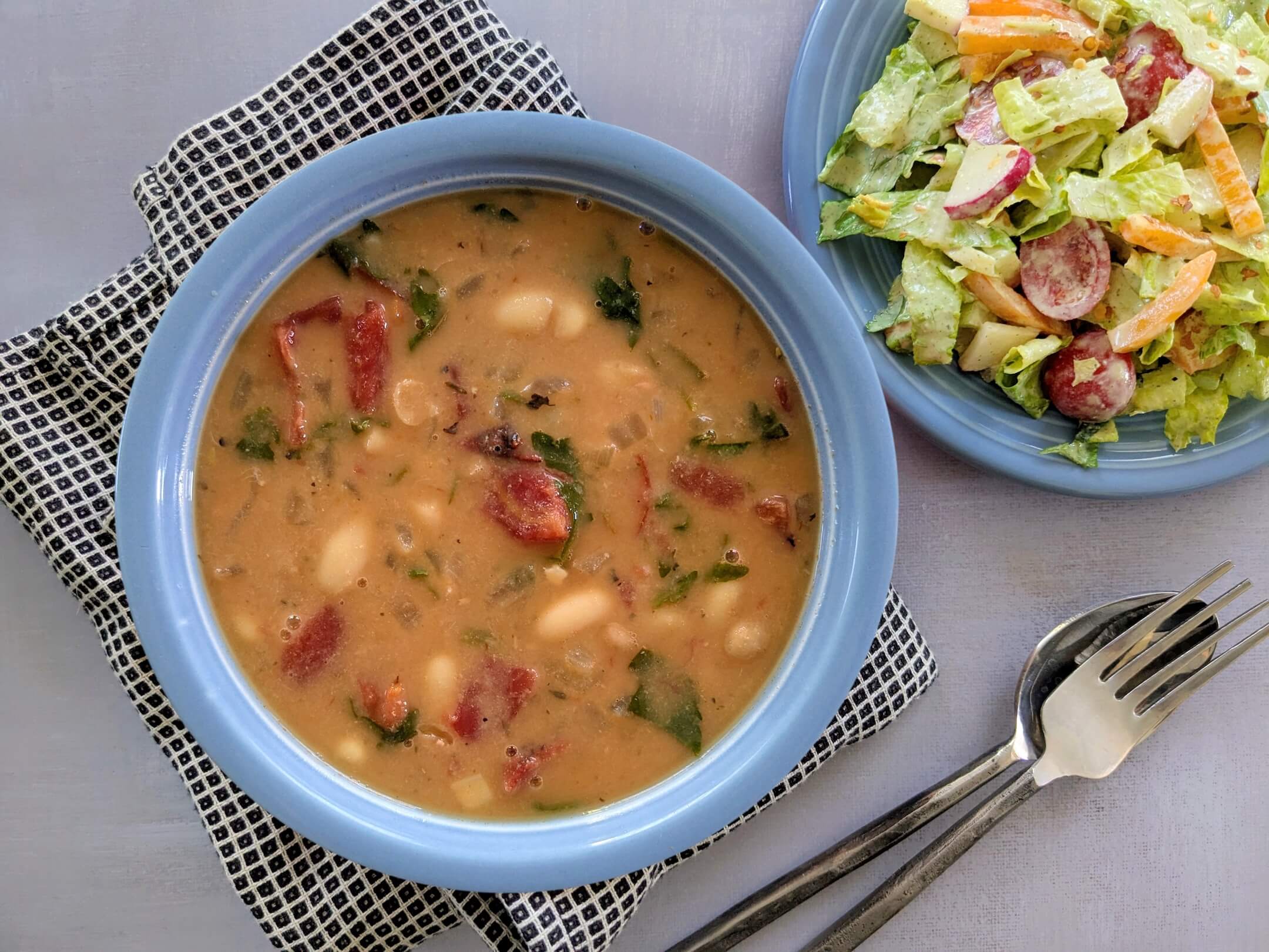 Fire-roasted White Bean Soup paired with Cilantro Lime Chopped Salad