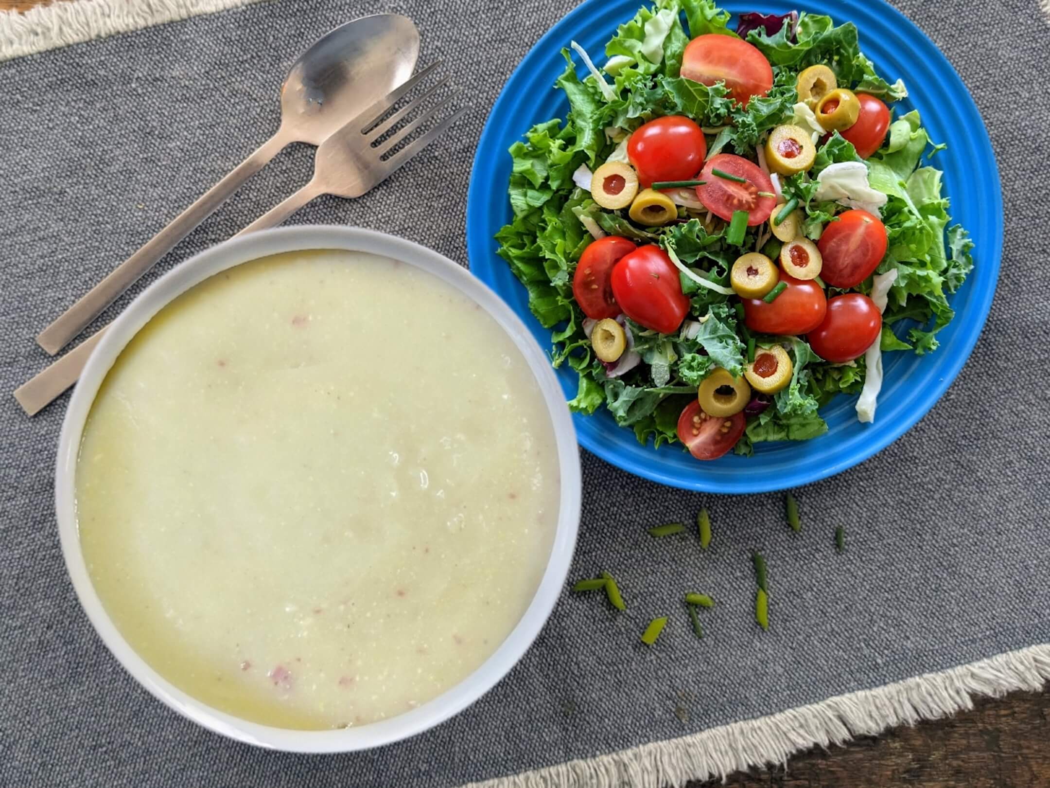Velvety cauliflower soup and tomato chive salad