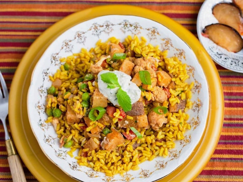 Aloo Gobi Matar over Turmeric Spiced RIce with Cumin Lime Sour Cream