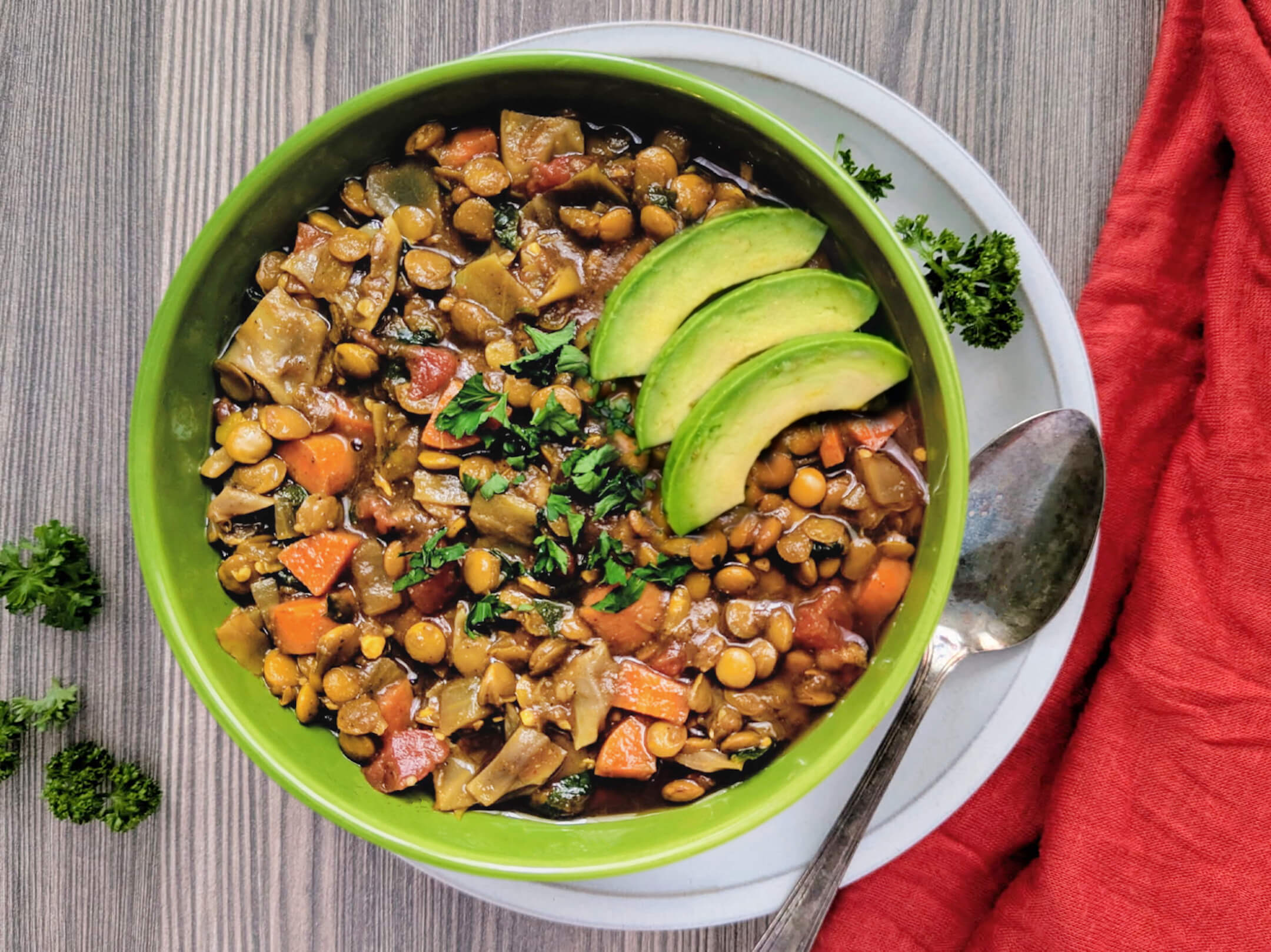 moroccan lentil stew with spinach and avocado