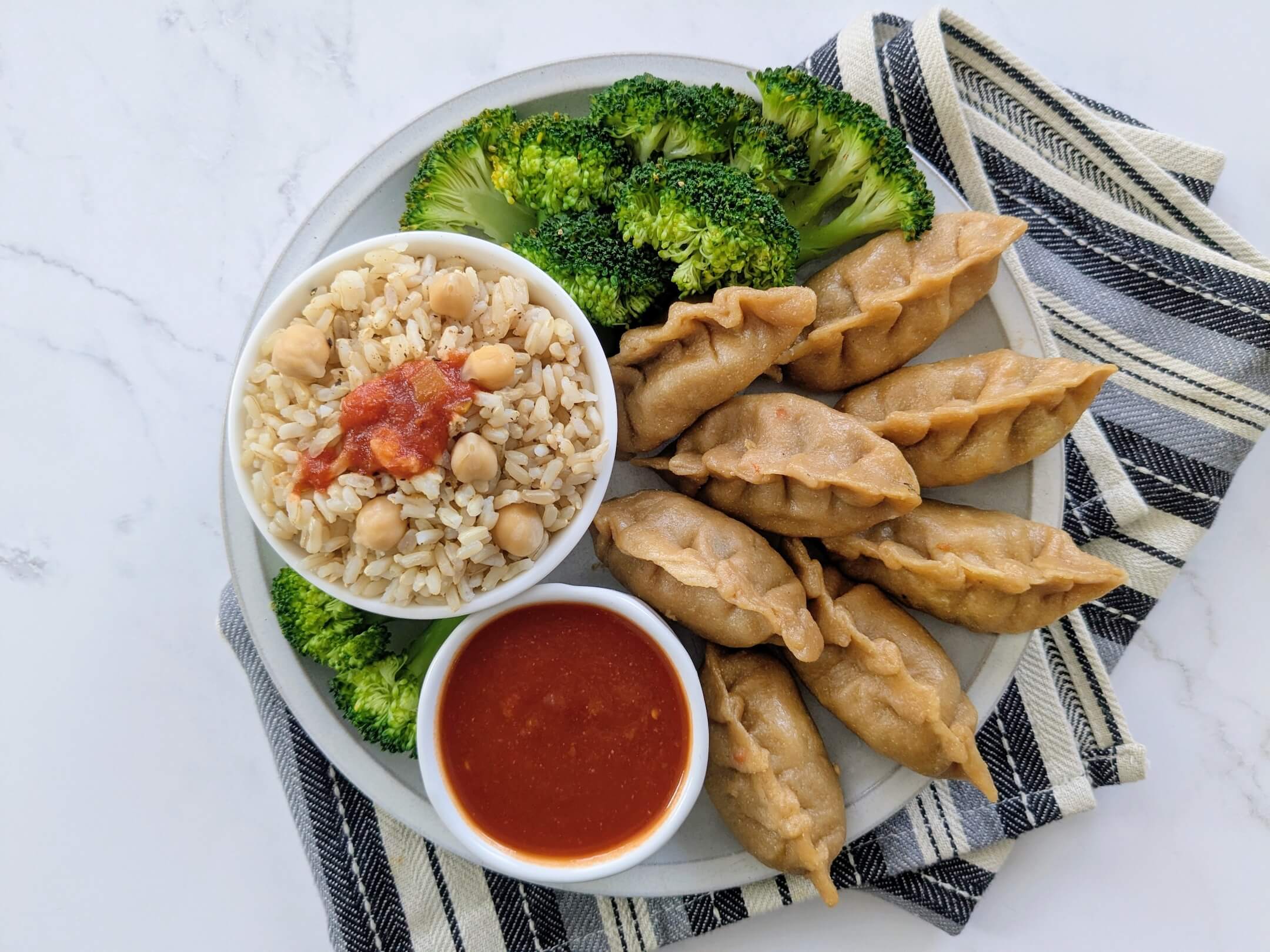 Nepalese Momos with Spicy Dipping Sauce, Broccoli and Basmati Rice