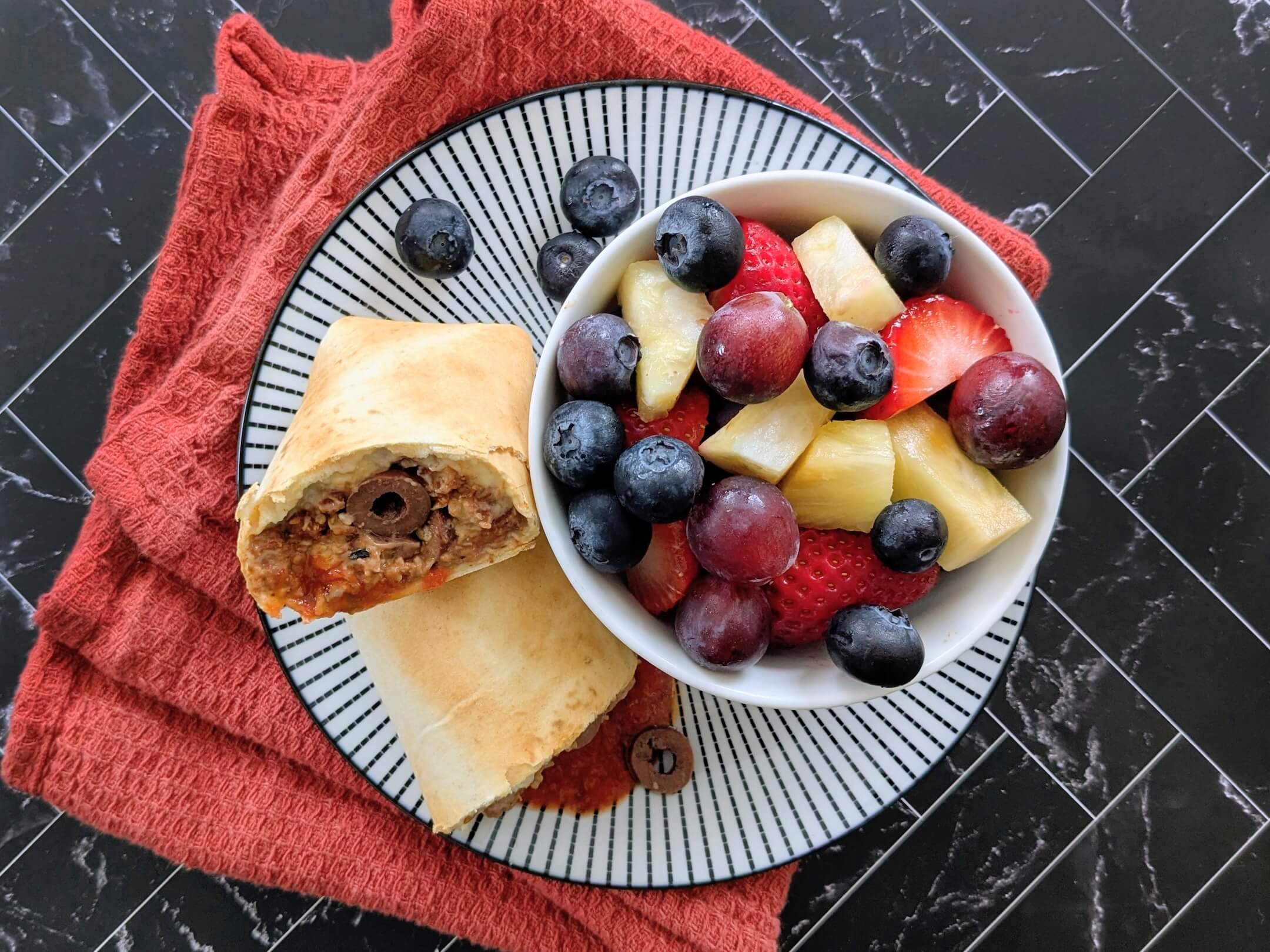 plant based Hot Pizza Pockets and Supersized Fruit Salad 
