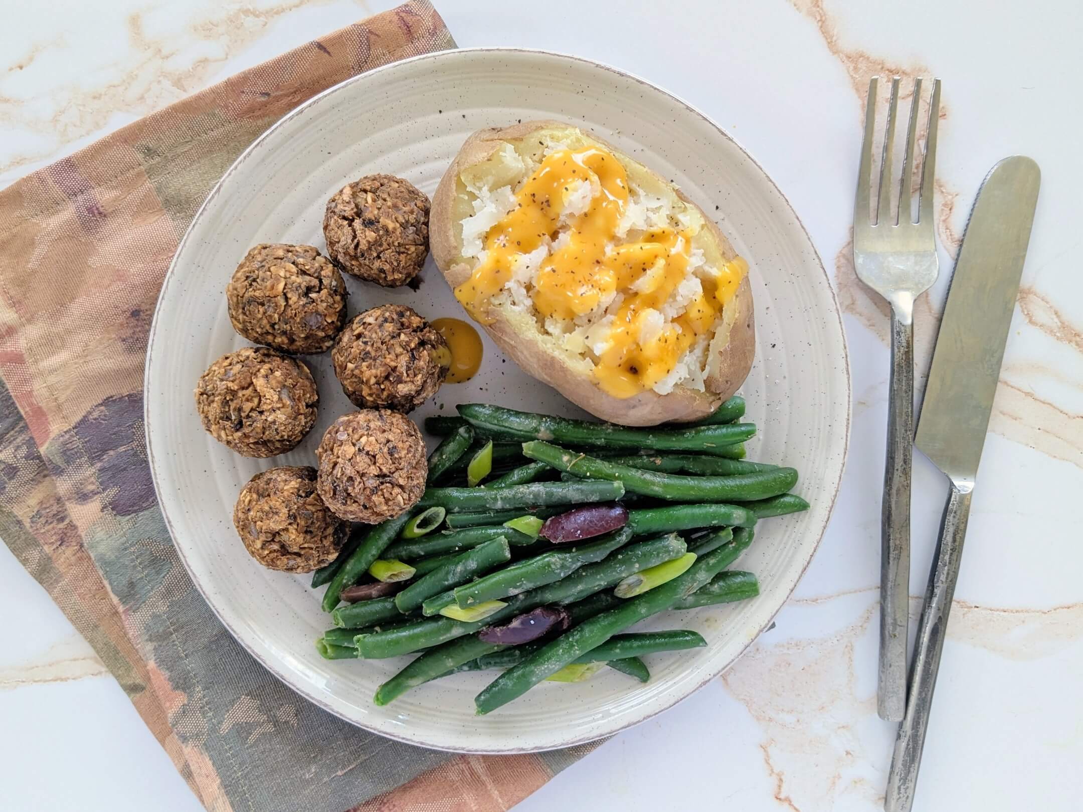 Mushroom Meatballs, Cheesy Baked Potato and Fancy Green Beans 