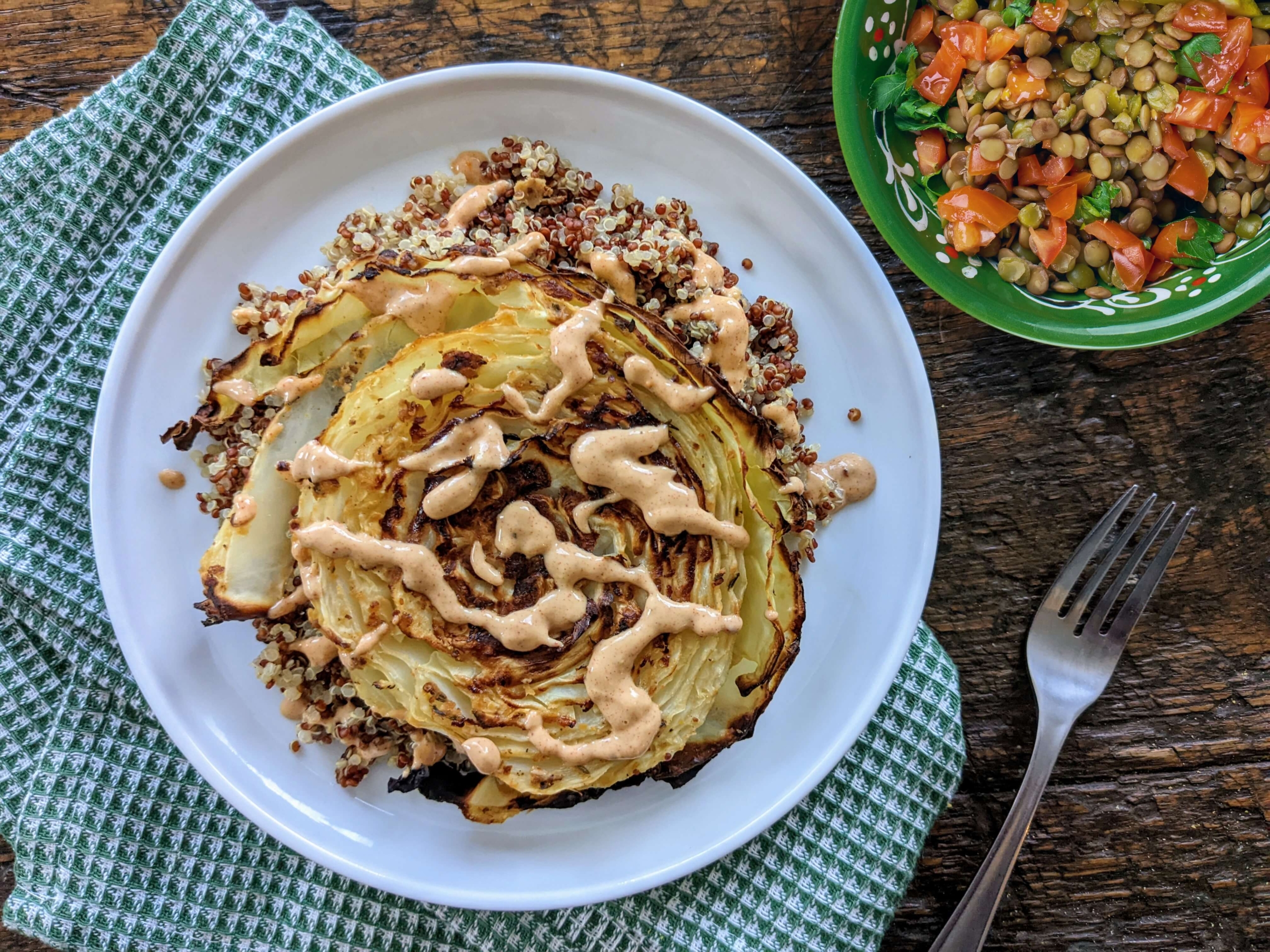 Roasted Cabbage Steaks over Quinoa with Smoky Paprika Sauce and Lemony Lentil Salad (Azifa)