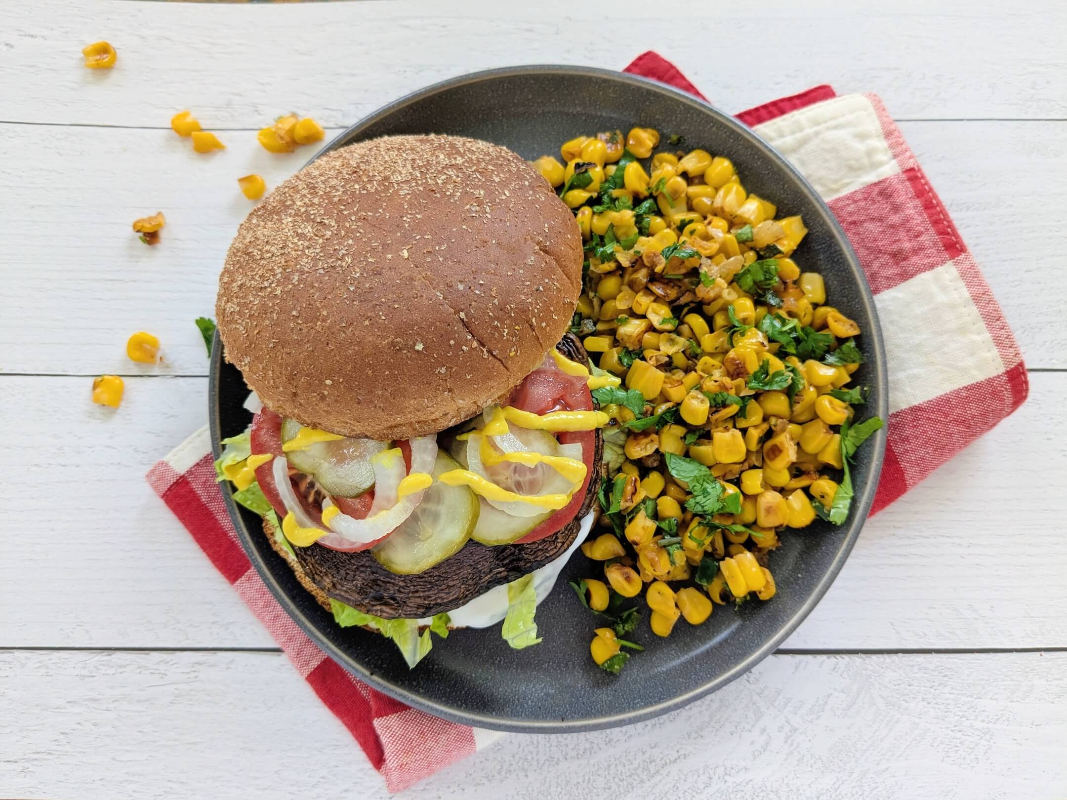 Portobello Burgers and Charred Corn & Herb Salad plant based meal